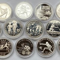 Ulike land OL Atlanta 12 stk. sølv mynter, 320,75 g rent sølv, proof